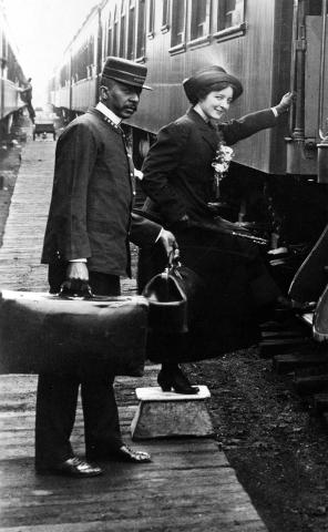 Porter during boarding, c. 1905