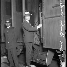 Porter at boarding time, undated